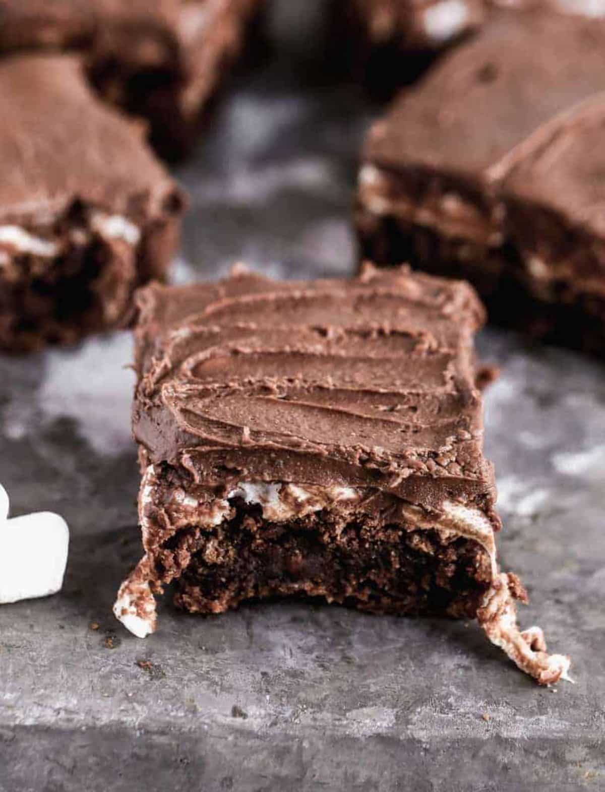 Mouth-watering mississippi mud brownies on a gray tray.