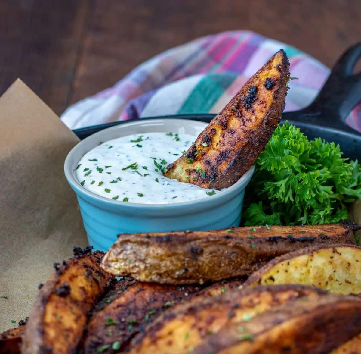 A bowl of spicy horseradish aioli with a homemade fry.