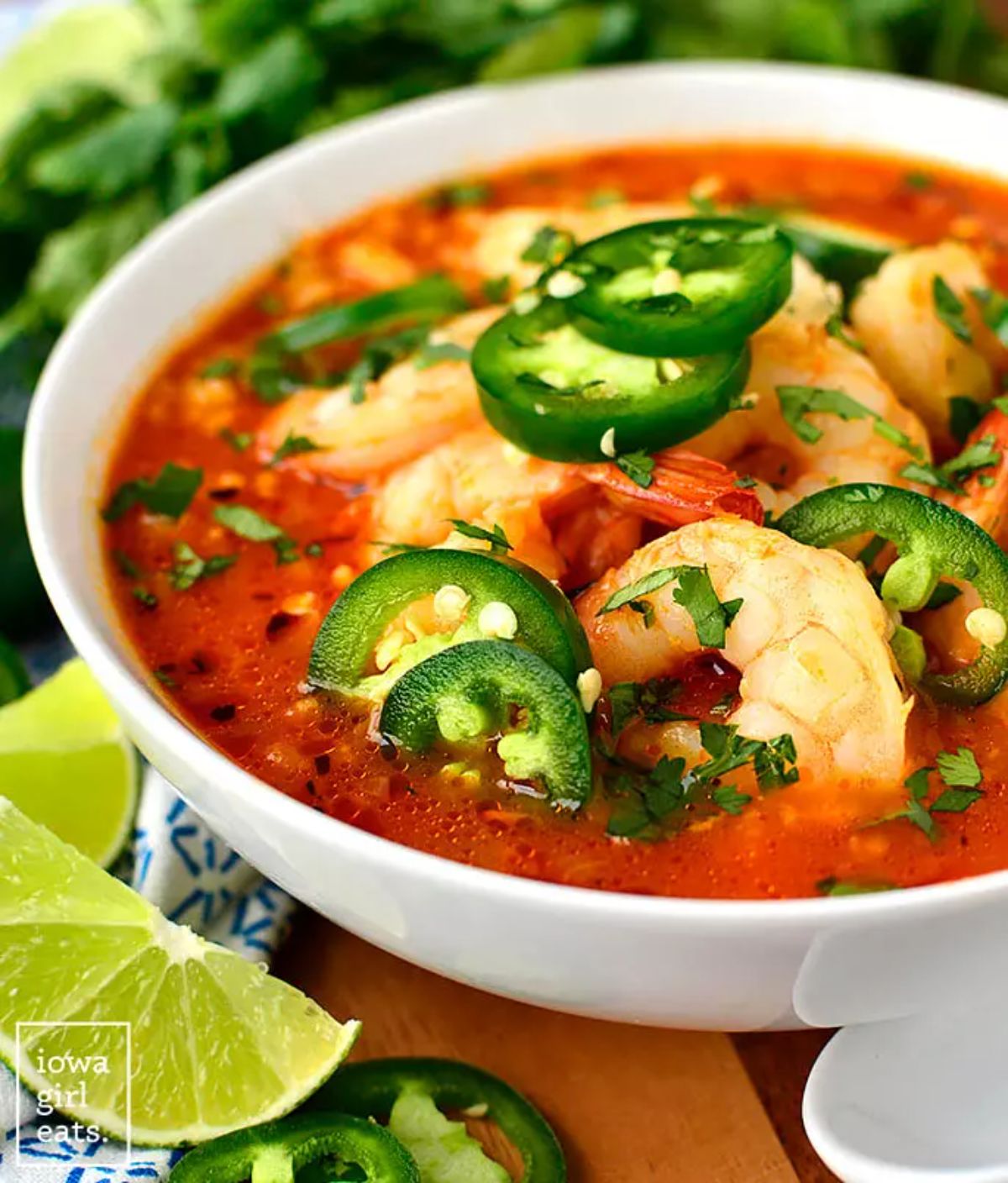 Scrumptious shrimp soup in a white bowl.