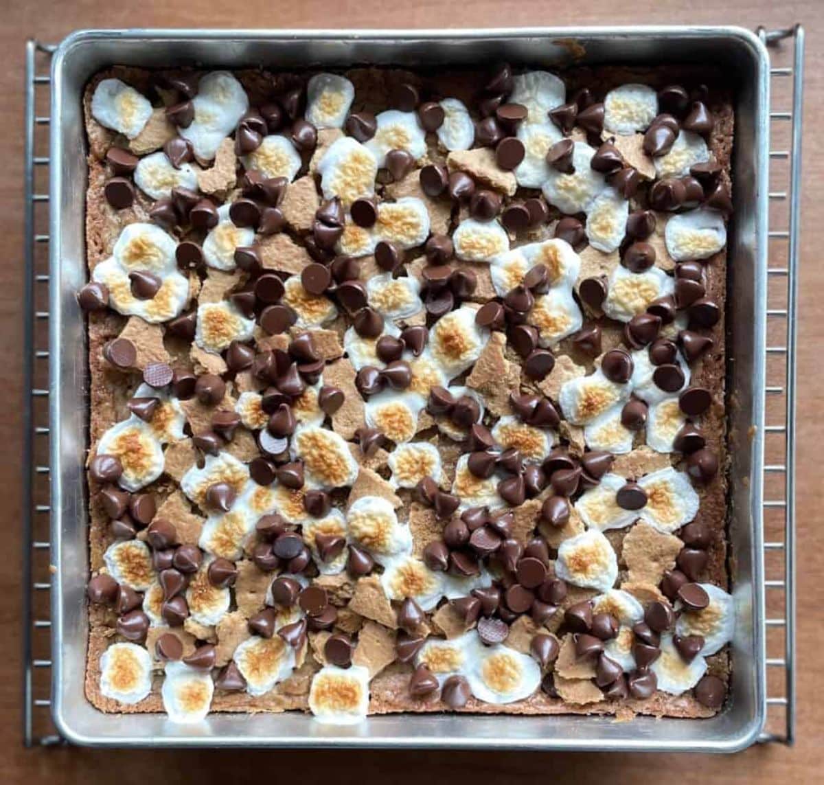 Tasteful chocolate chip marshmallow cookie bars in a baking tray.