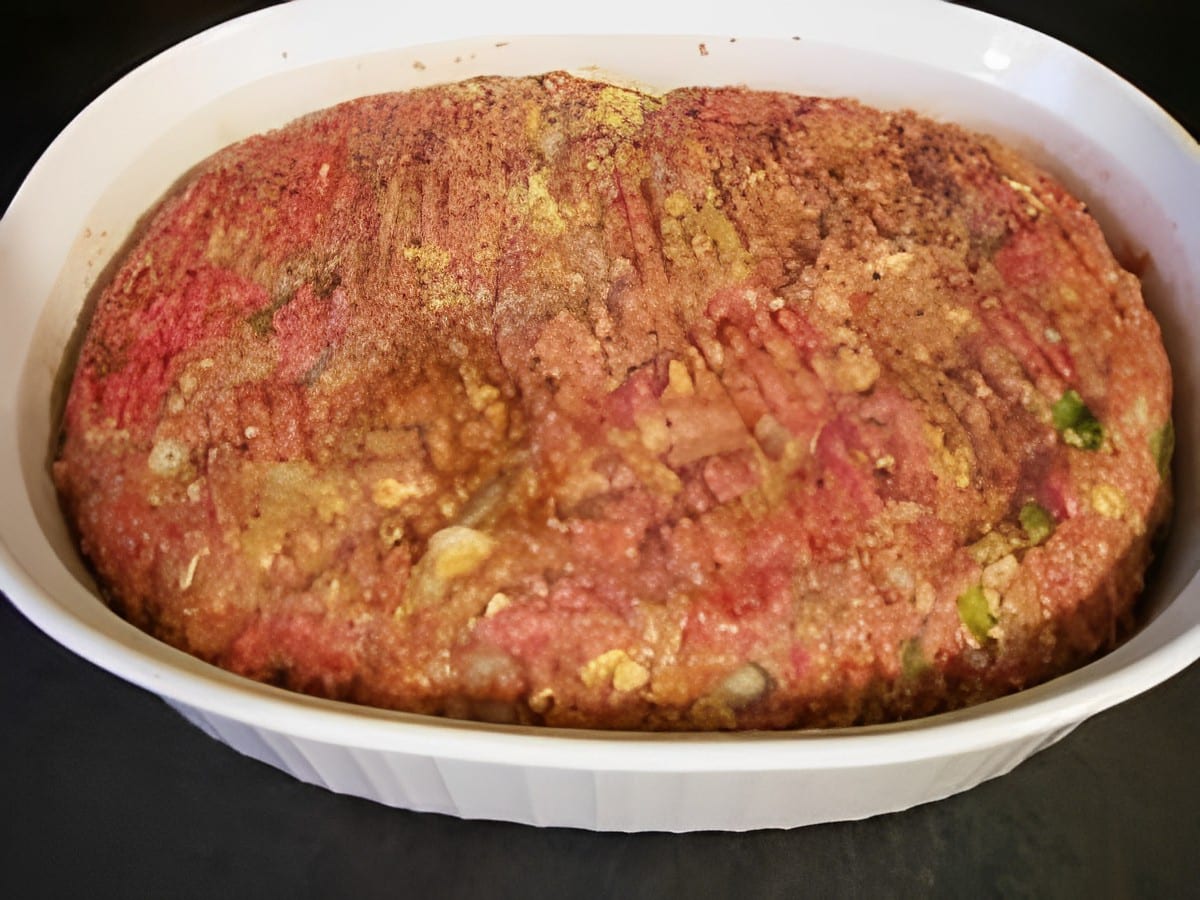 Fresh bison meatloaf my way in a white casserole.