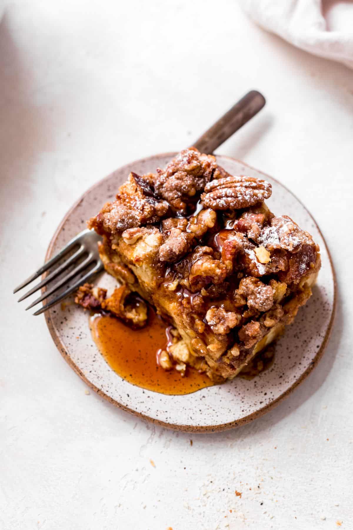 Scrumptious pumpkin french toast on a plate with a fork.