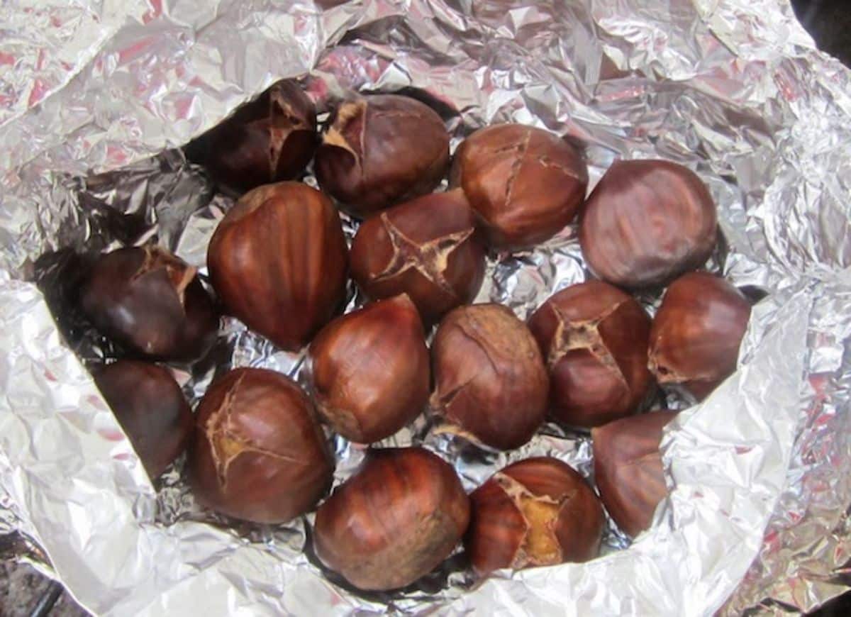 Crispy roasted chestnuts in a foil.