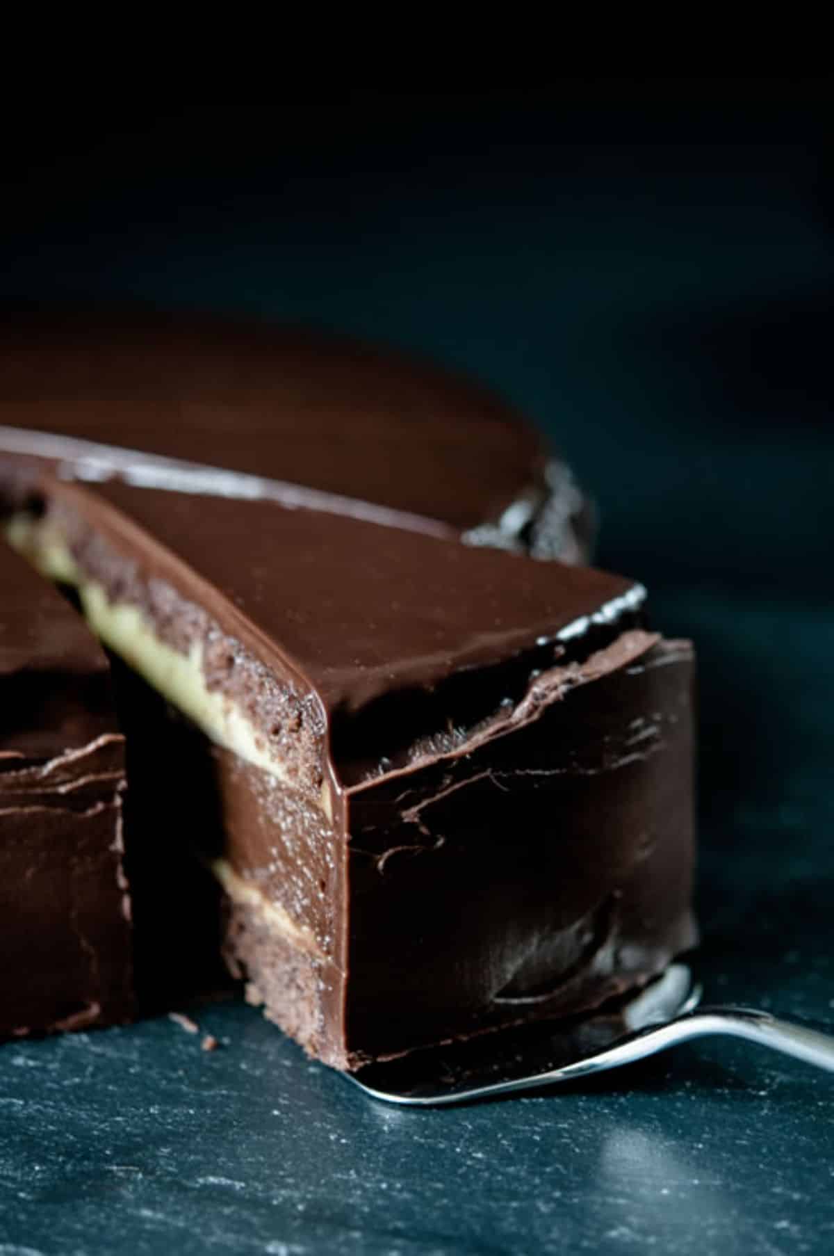 Mouth-watering passion fruit truffle cake on a table.