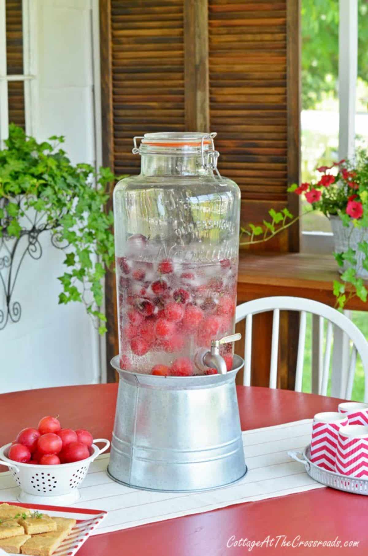 Refreshing sparkling cherry wine on a table.