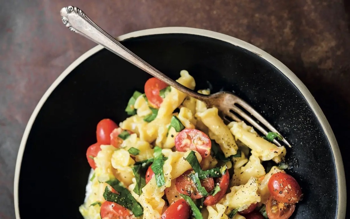 Campanelle pasta with sweet corn tomatoes and basil