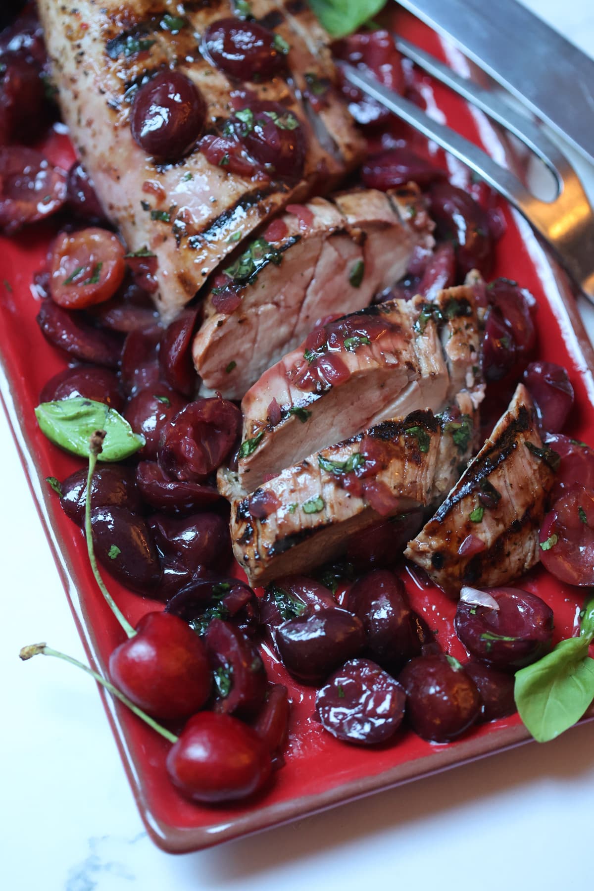 Grilled pork tenderloin with cherry sauce