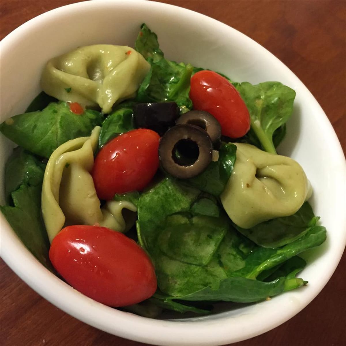 Spinach and tortellini salad