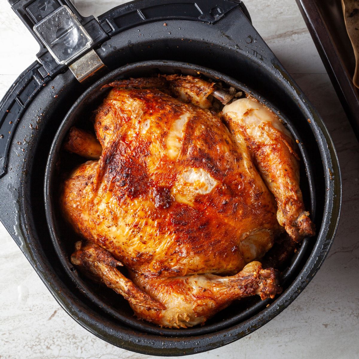 https://cottageatthecrossroads.com/wp-content/uploads/2023/09/37-delicious-air-fryer-whole-chicken-recipes-featured-recipe.jpg