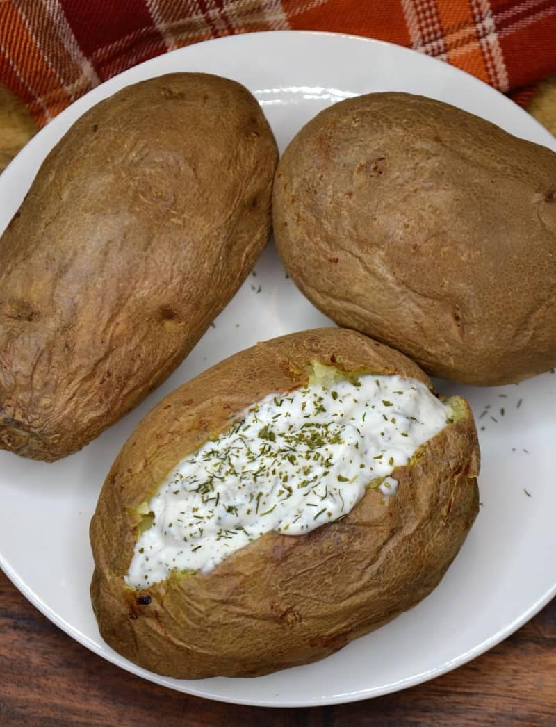 Air fryer baked potato recipe with seasoned sour cream