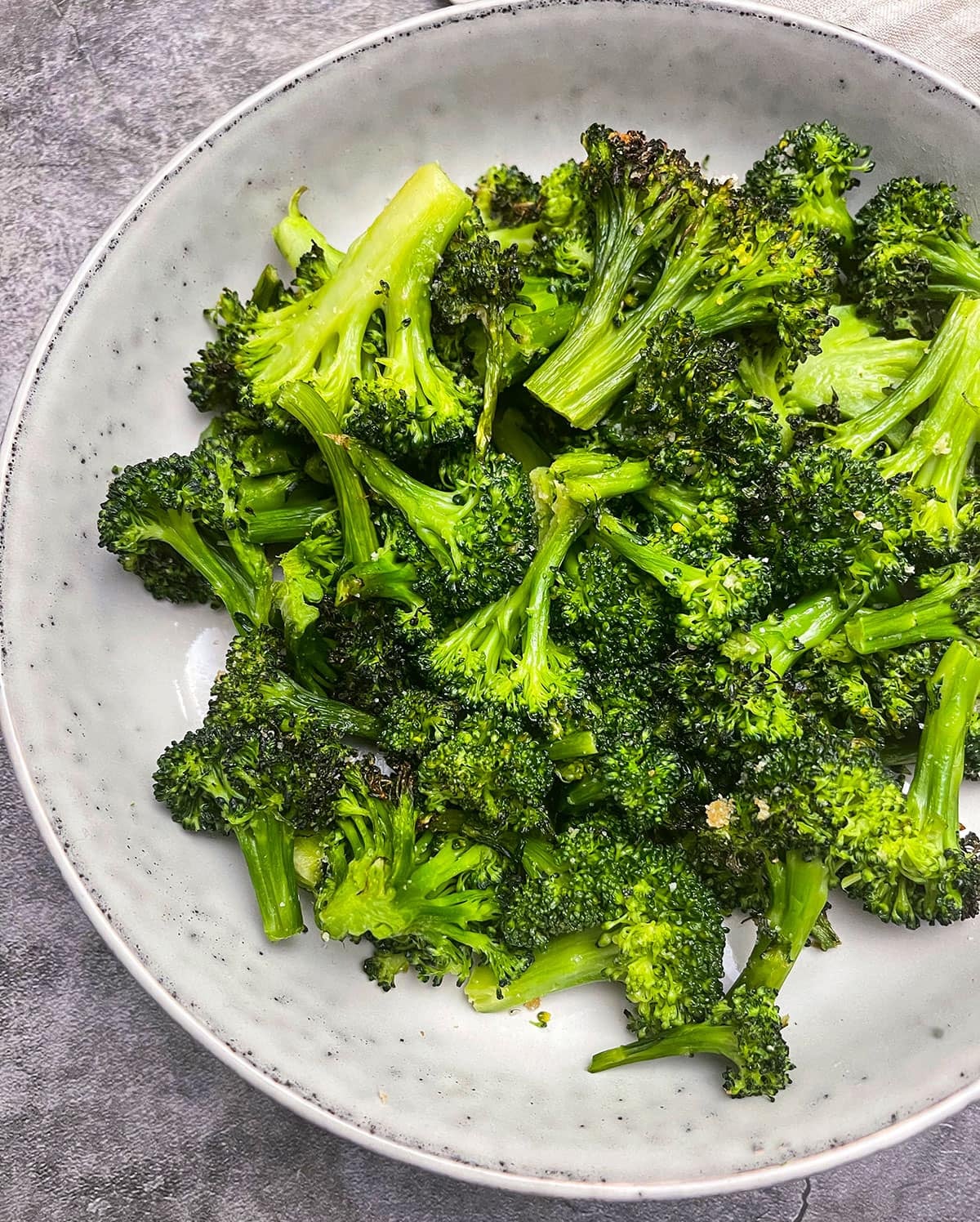 Air fryer frozen broccoli with nutritional yeast flakes