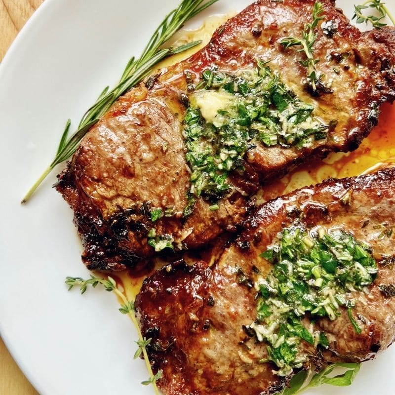 Air fryer ny strip steak with garlic herb butter