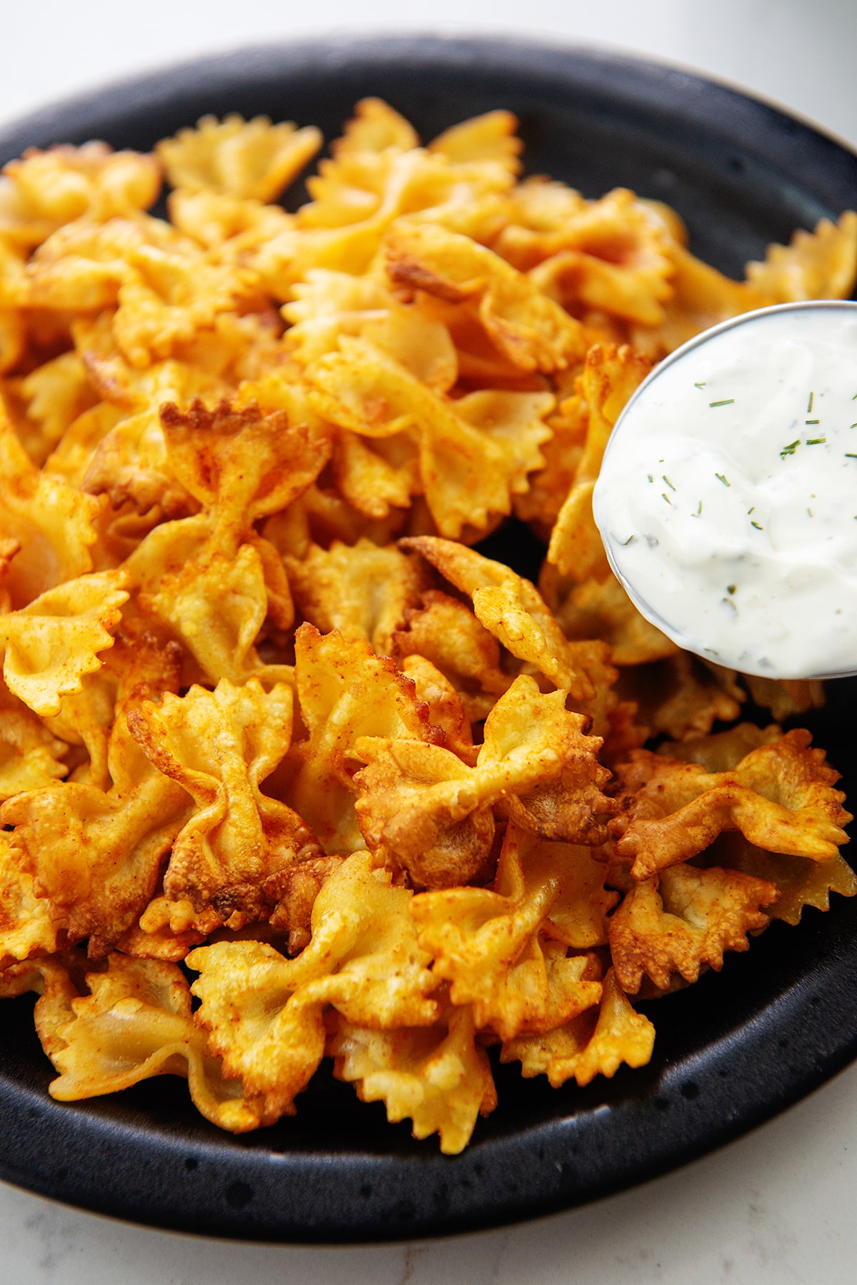 Air fryer pasta chips with spicy buffalo ranch