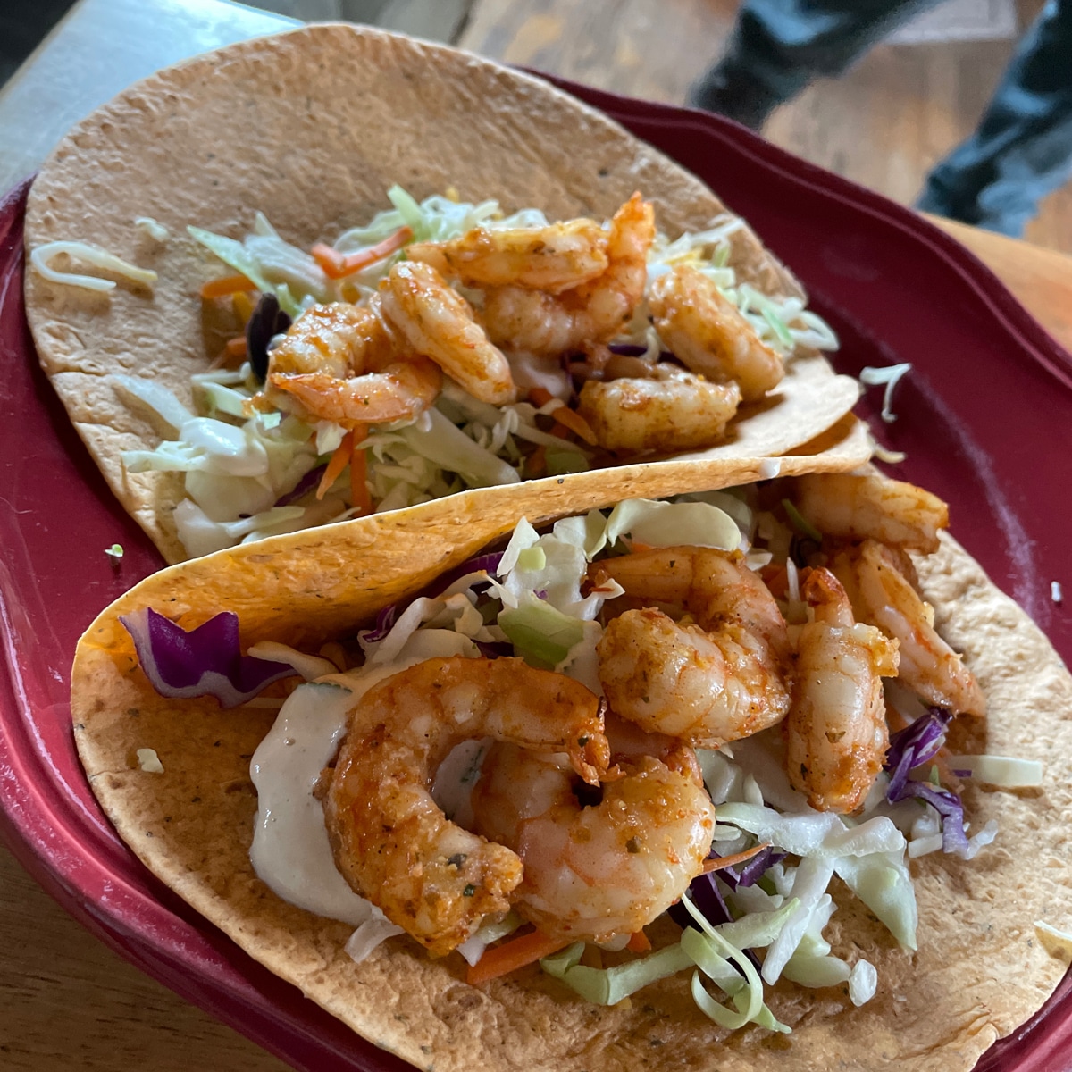 Air fryer shrimp tacos with creamy cilantro sauce