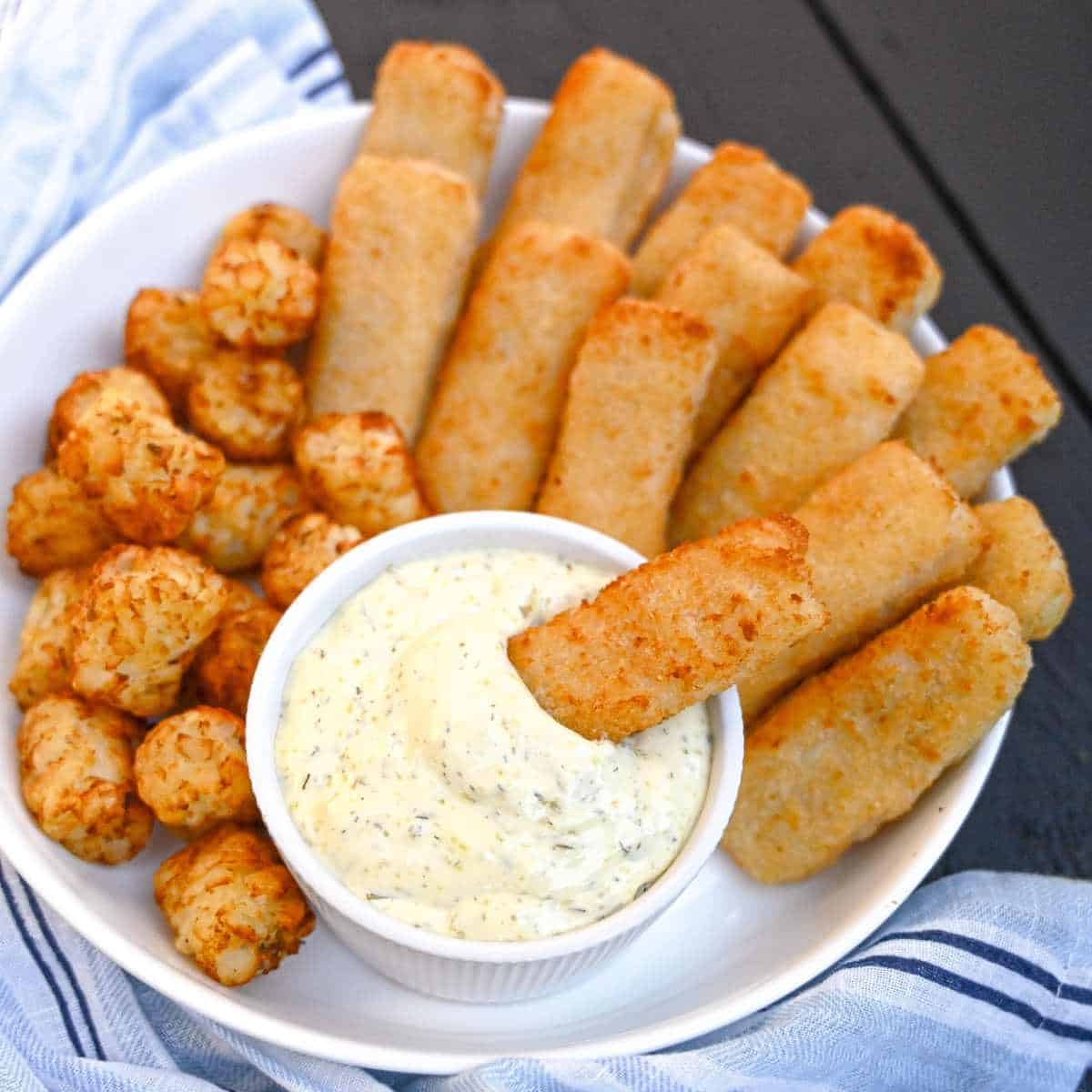 Frozen fish fingers in air fryer with sauce