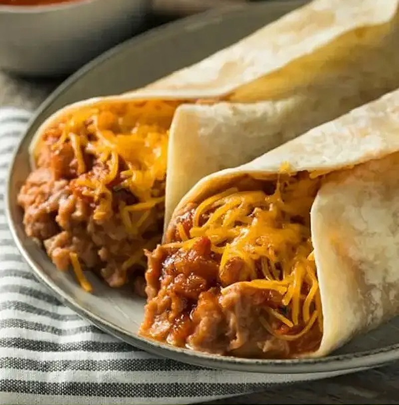 Air fryer mexican burritos with bacon bits and ground sausages